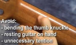 where to place your thumb to play the D chord on guitar