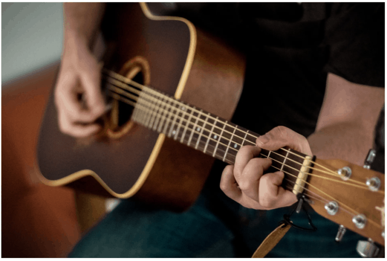 How To Strum A Guitar Real Guitar Lessons by Tomas Michaud